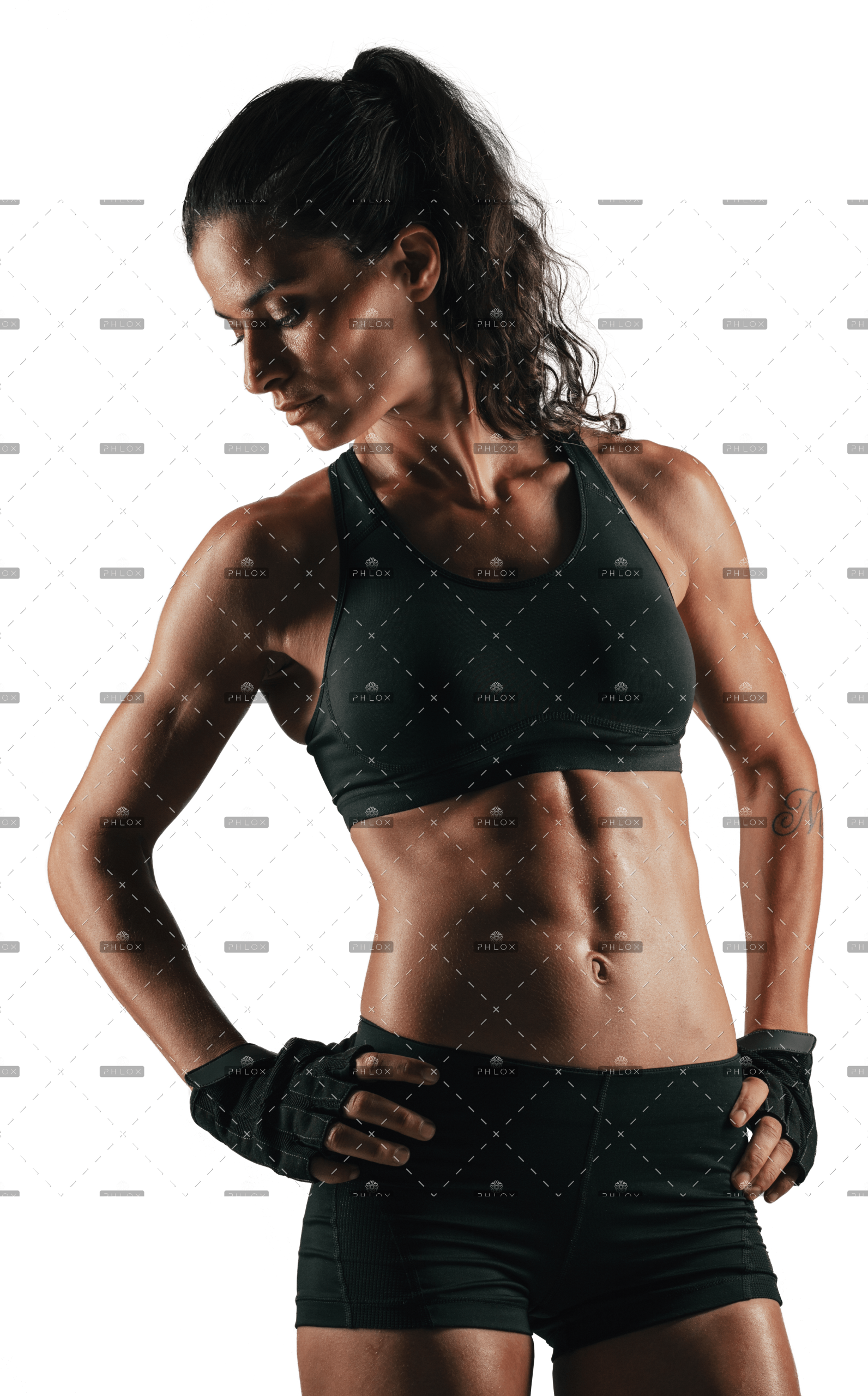 demo-attachment-170-woman-looking-back-while-flexing-abdominal-PAANKZB